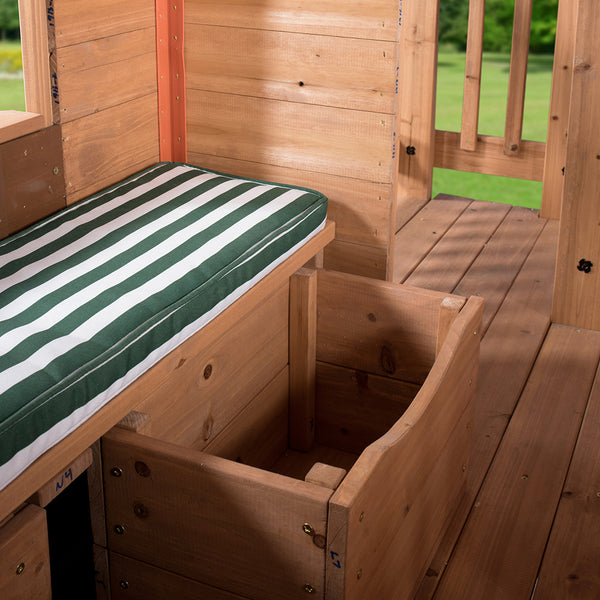 Cushion Seat With Storage A cozy sitting space atop compact storage for toys and kitchen foods.