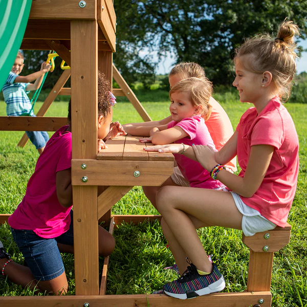 Endless Hours of Fun Provide hours of entertainment with a sandbox, activity table, acrobat bar, and covered clubhouse.