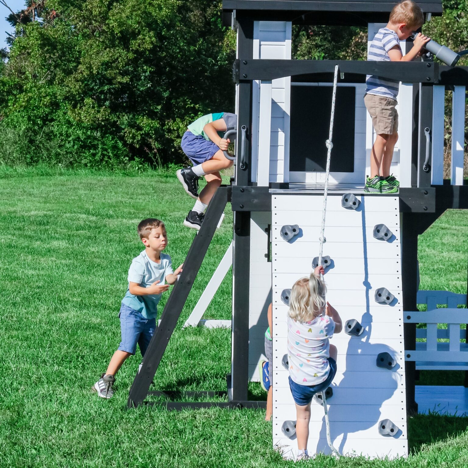 kids playing on canyon creek swing set