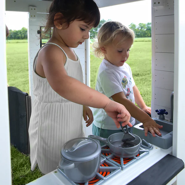 Sink & Stove A tiny baker's gourmet kitchen where they can cook up creativity with a sink, stove, cordless phone, working doorbell, and pot and pan set with utensils.