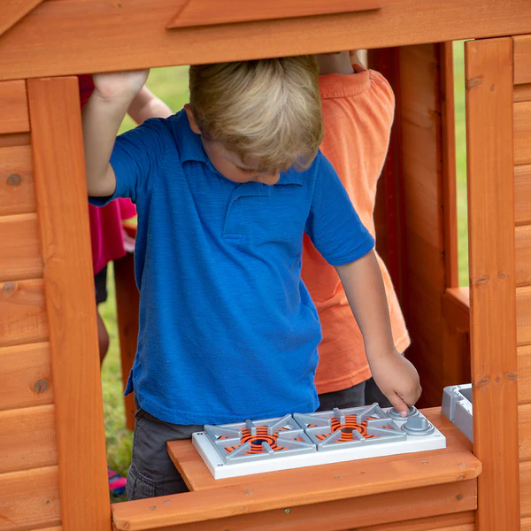 Cook Up Creativity An indoor kitchen with a sink, stove, and cordless phone provide hours of imaginative play.